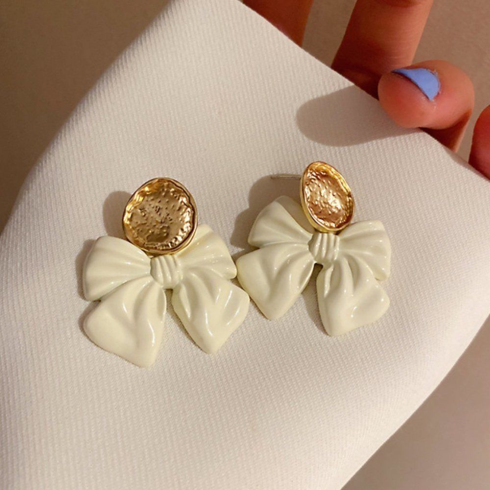 White gold bow earrings